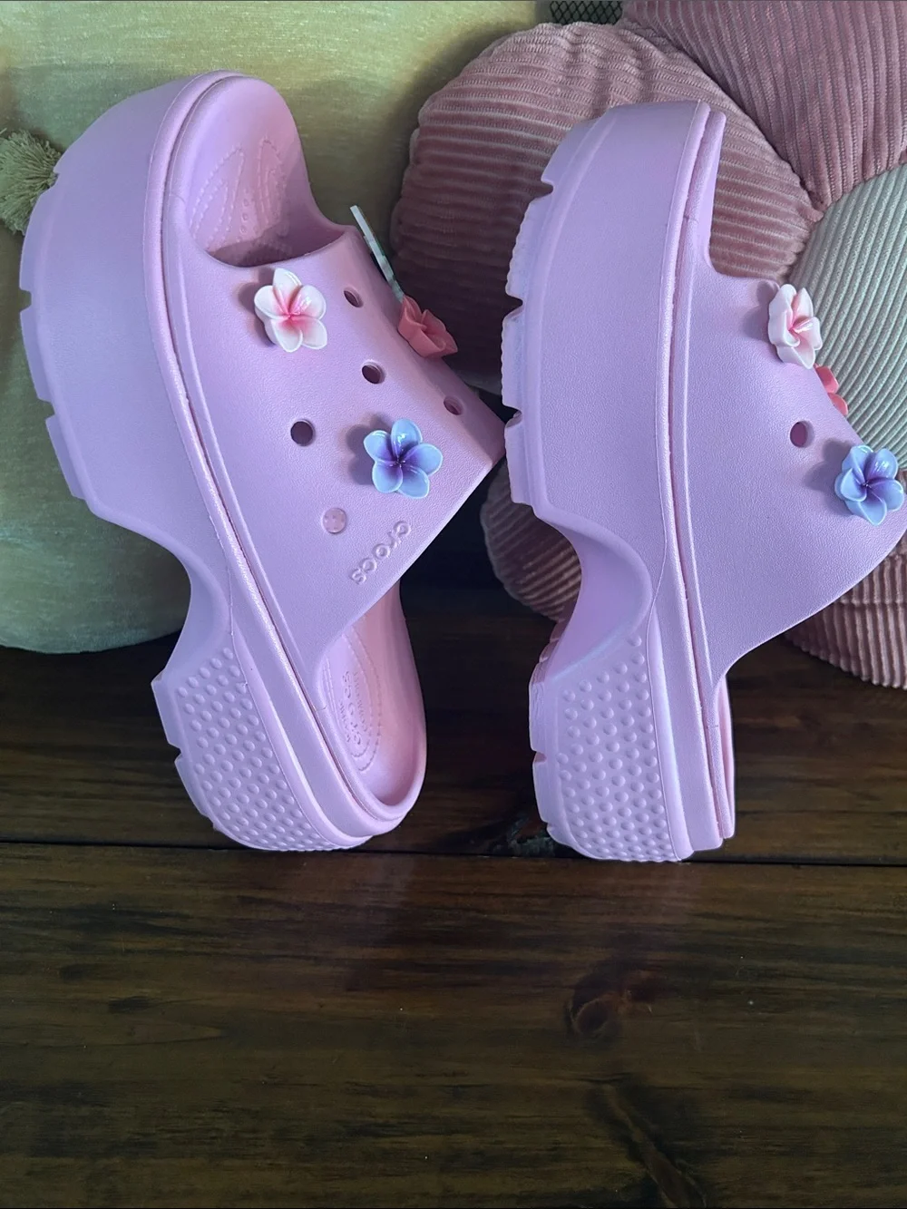 Crocs Pink stomp slides with charms